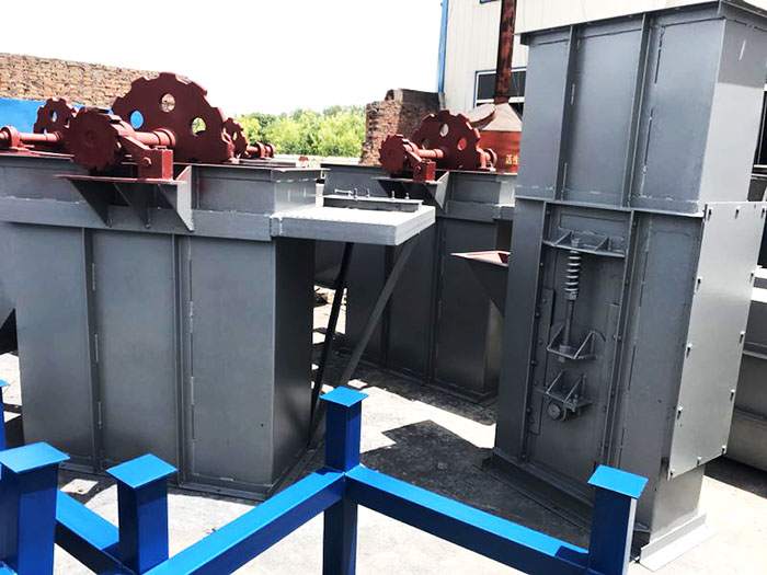 板鏈斗式提升機底部積料漏粉現(xiàn)場改造方案圖解